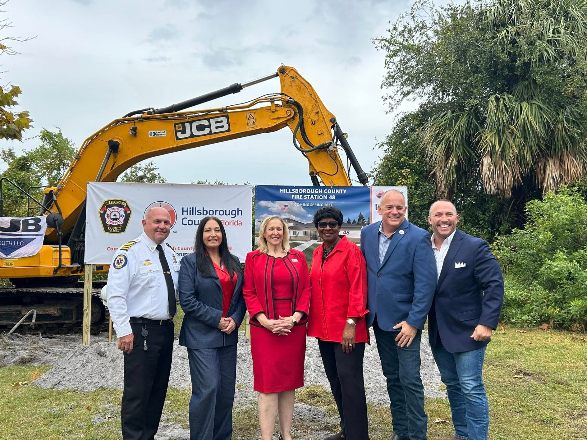 Donna with the Fire Chief and county leaders at the Fire Station 48 groundbreaking