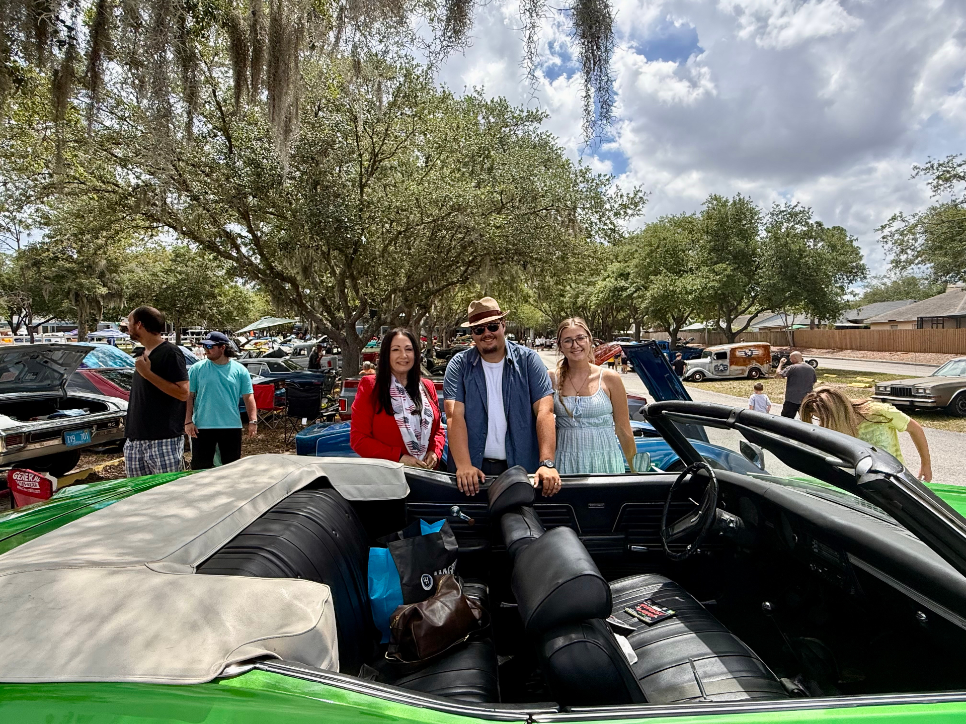 Donna meeting residents at a local car show community event