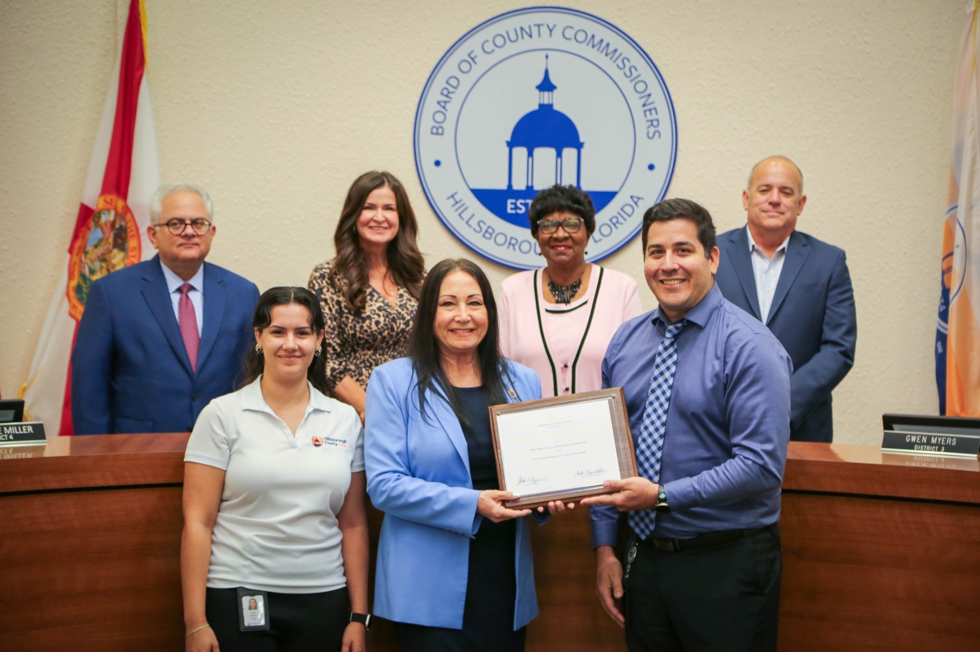 Donna presenting a proclamation at a Hillsborough County Board of County Commissioners meeting
