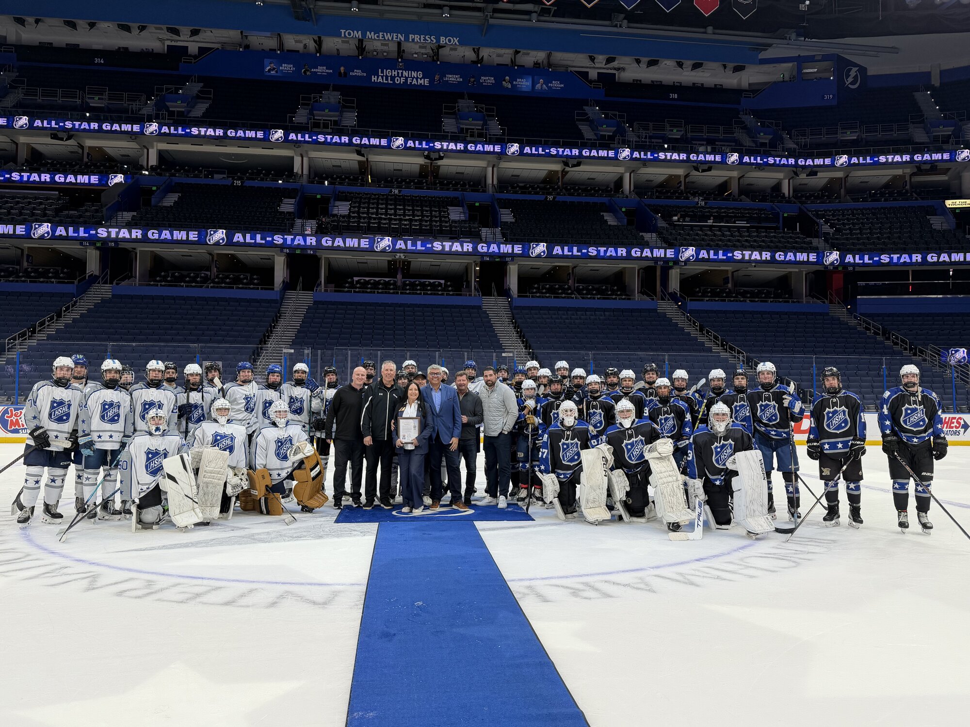 Donna honoring the Lightning High School Hockey League All-Star teams at Amalie Arena