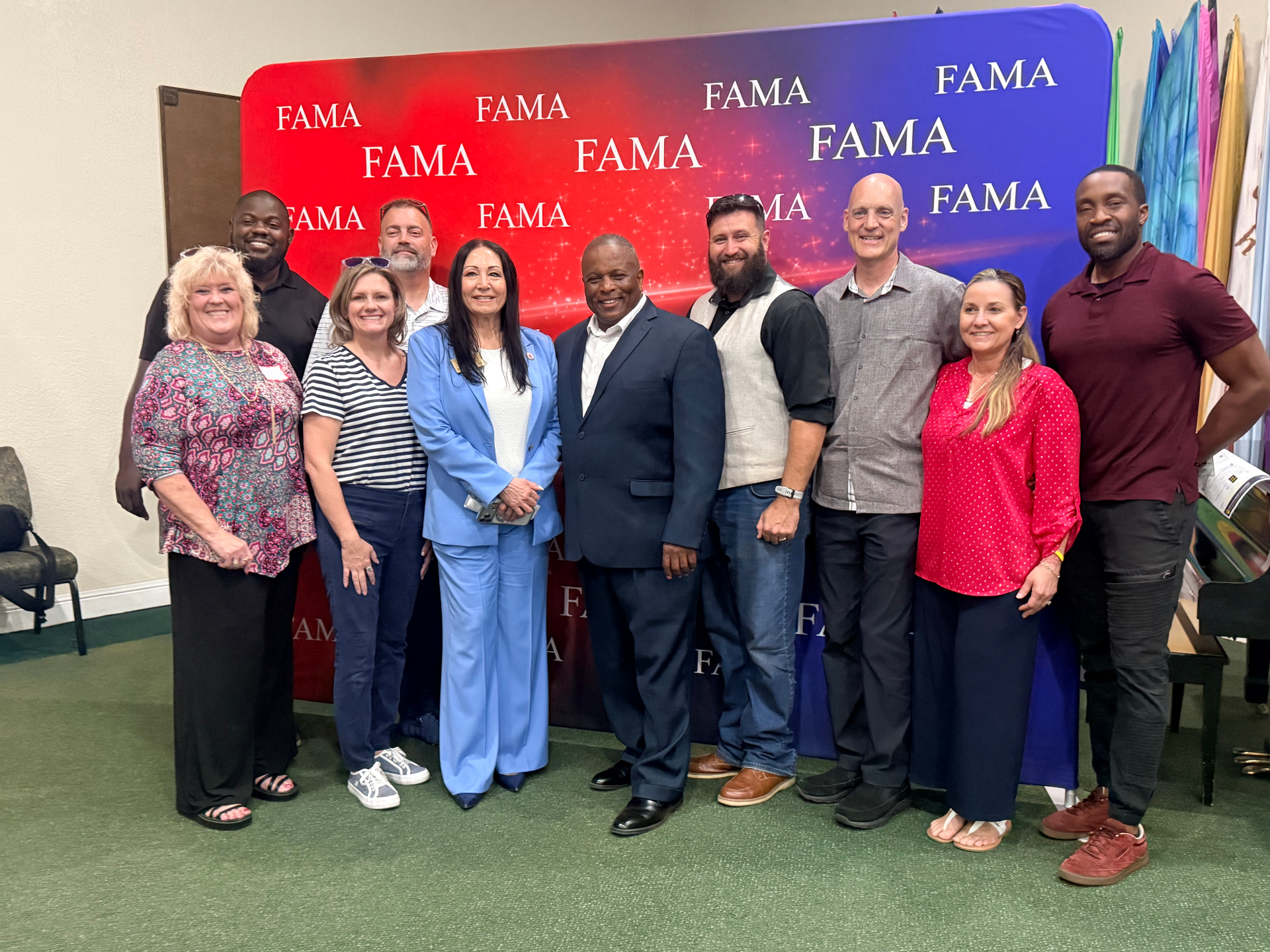 Donna with community leaders at a FAMA gathering